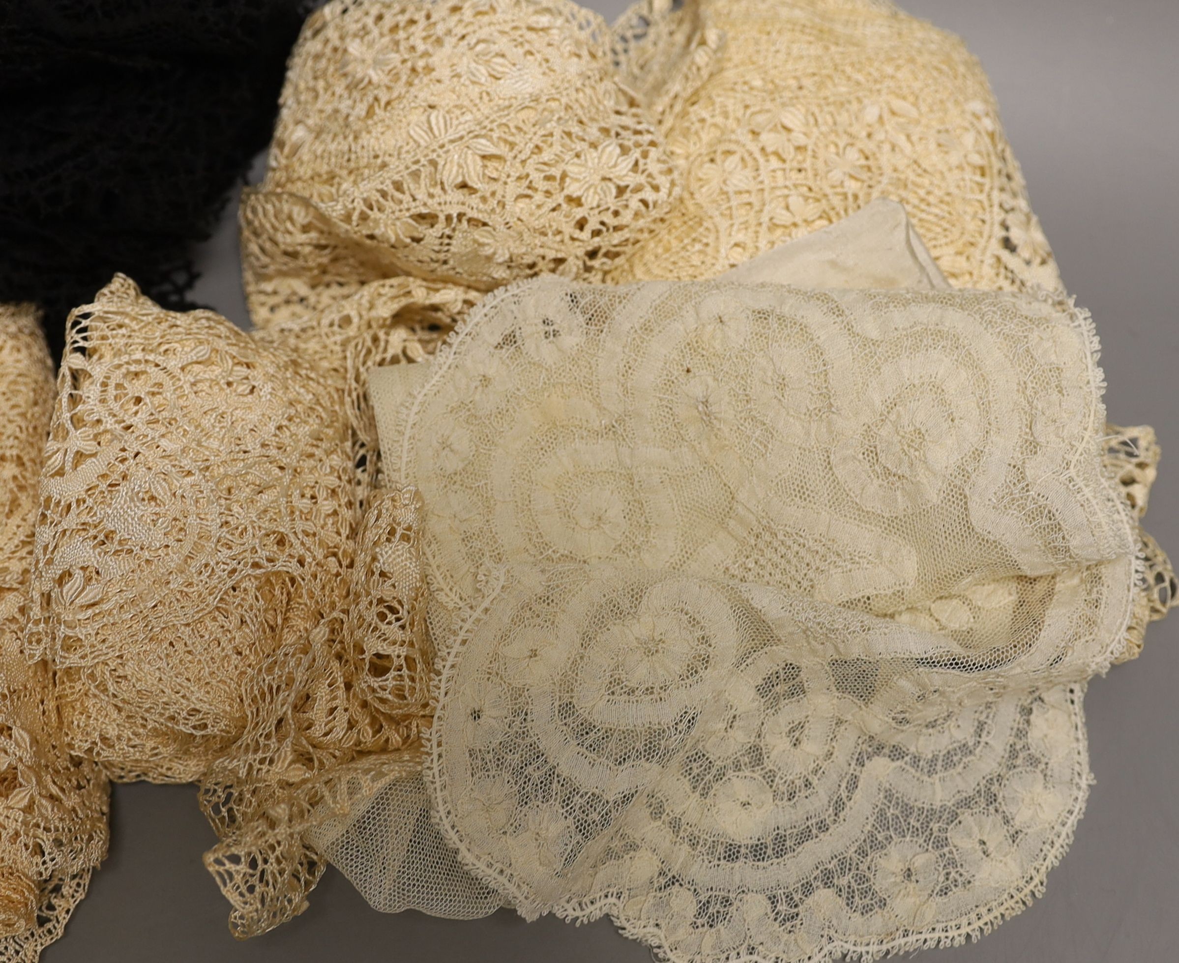 Two 19th century lengths of silk Maltese bobbin lace, two similar lengths, a hankie, black lace stole etc.